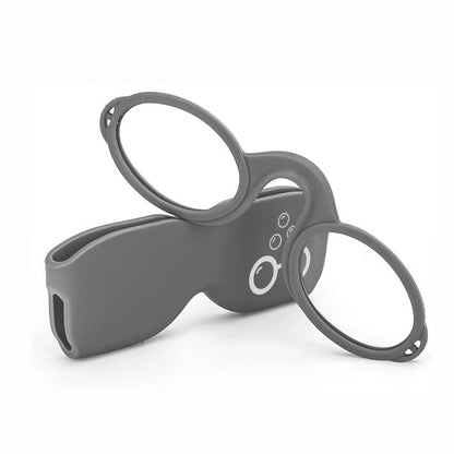 Grey armless Sudzsees™  glasses resting on a matching grey case with a white Sudzsees™  bubble logo mark on white background